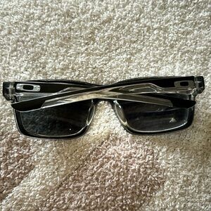 Oakley Sunglasses, no major scratches just one small scratch on the right lens.